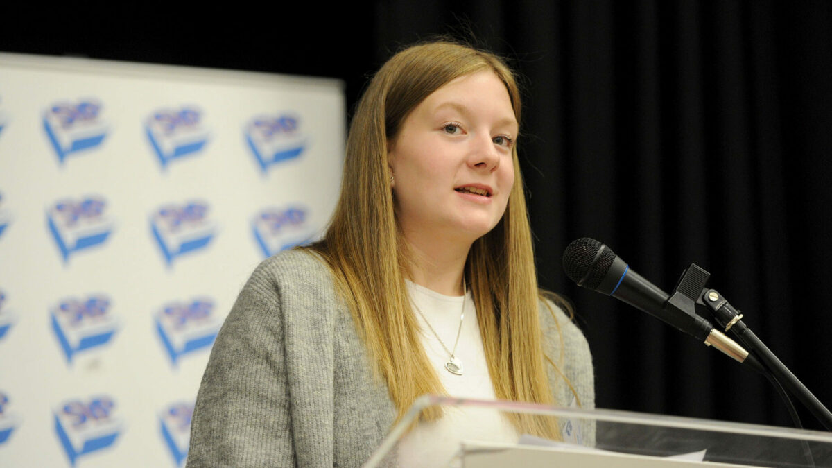 Ellie Craig MSYP speaking at a lecturn at SYP77
