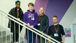 Sistema Scotland guests at SYP's 80th National Sitting in Aberdeen in October 2023 - from left to right, Tochi, aged 16, Cayden, aged 14, Anthony Cowie and Leo MacKenzie.