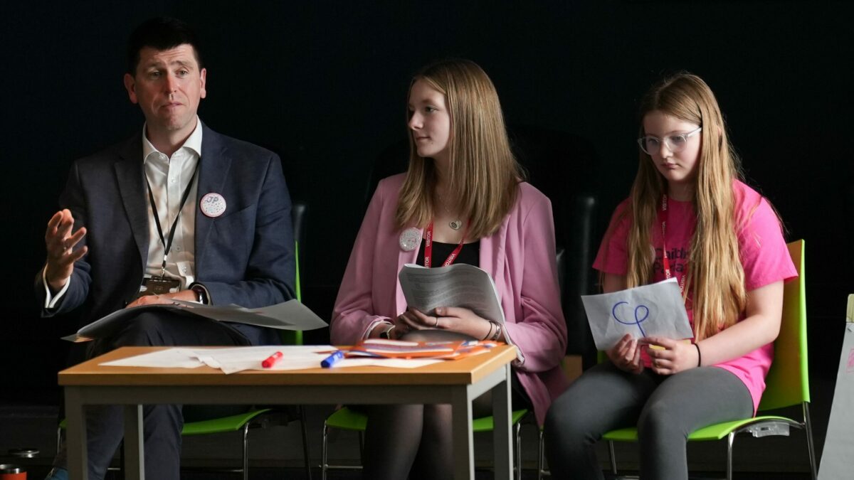Image of Scottish Government Permanent Secretary John-Paul Marks, SYP Chair Ellie Craig MSYP and a Member of the Children's Parliament.