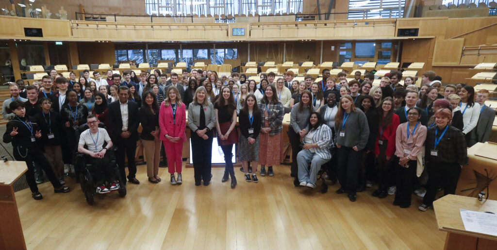 Members of the Scottish Youth Parliament, Scottish Parliament Presiding Alison Johnstone MSP and Member for Lothian, Foysol Choudhury MSP gathered in The Scottish Parliament chamber.