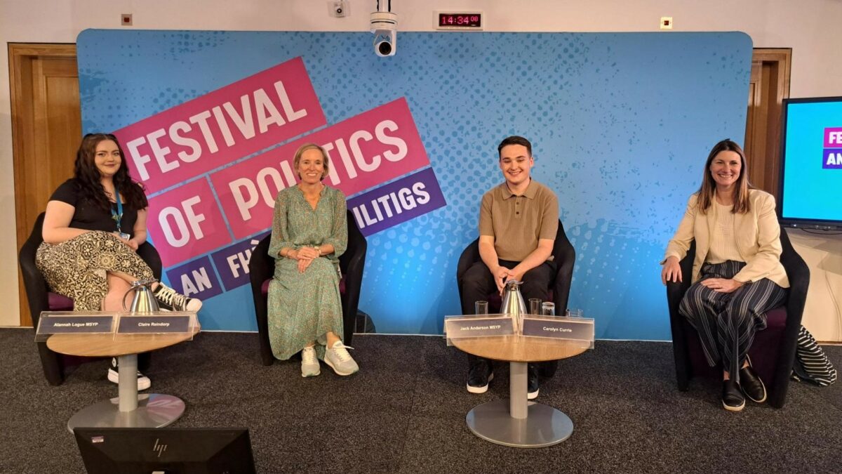 Sexism in the workplace session at the Festival of Politics 2024. From left to right, sitting on stage: Alannah Logue MSYP, Session chair and SYP trustee, Claire Reindorp, CEO at Young Women's Trust, Jack Anderson MSYP and Carolyn Currie, CEO at Women's Enterprise Scotland.
